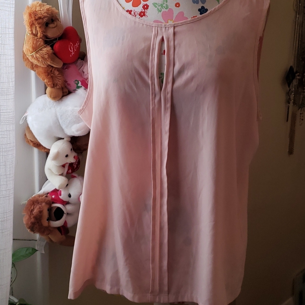 Pink sleeveless blouse